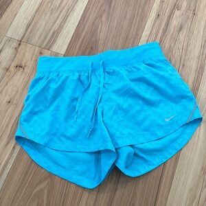 Nike dri-fit running shorts. Blue. Size small.